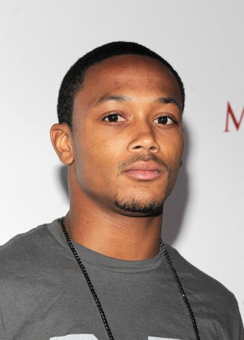 Romeo Miller poses for a picture during an event.